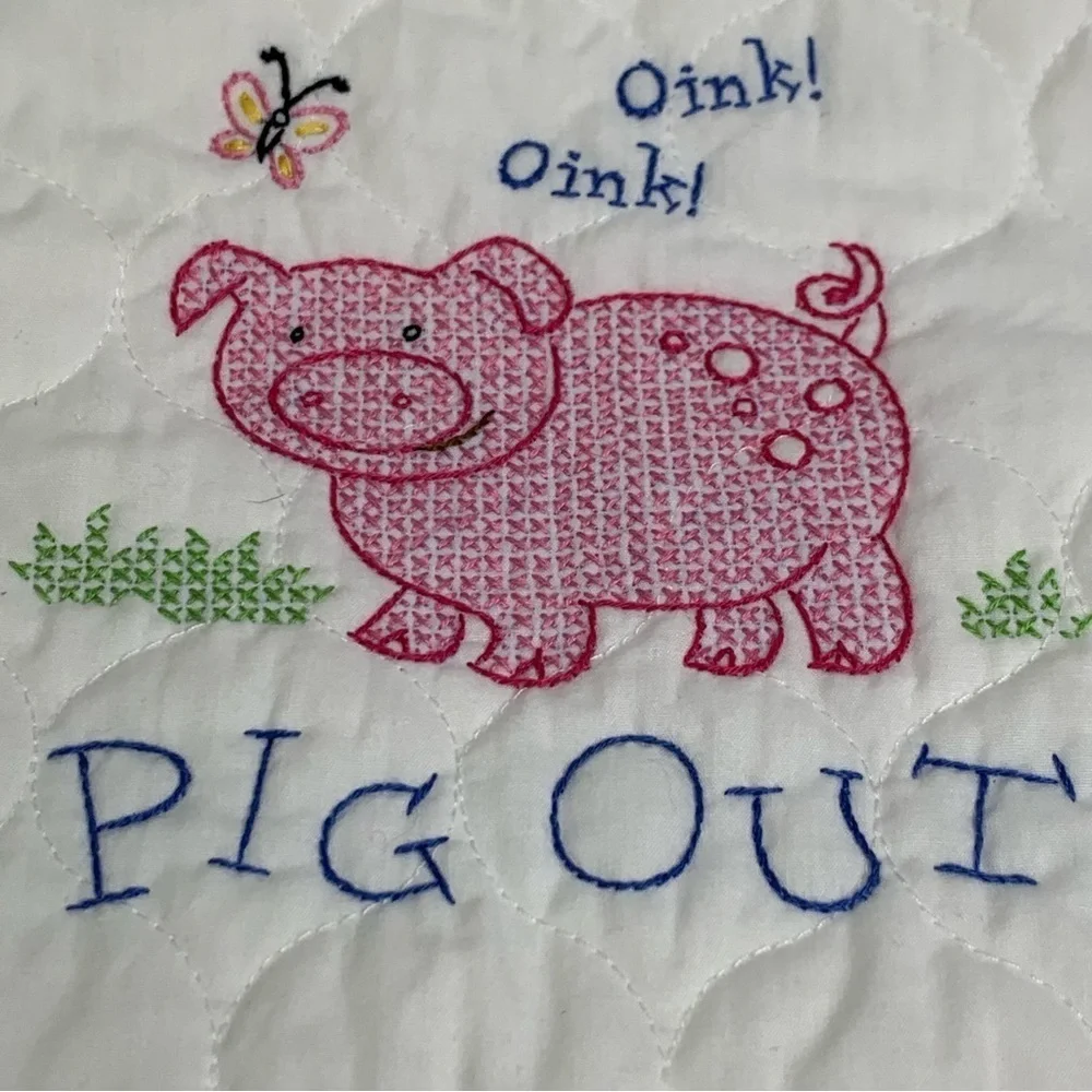 Oink Oink PIG OUT Handcrafted Cross Stitch Pink Pig’s Expression Above White Bib
